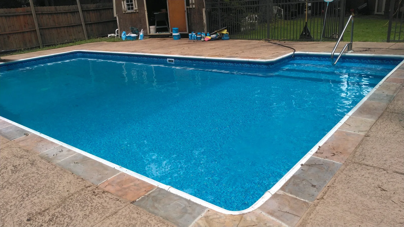 Blue water and a completed in-ground liner installed by The Pool Store